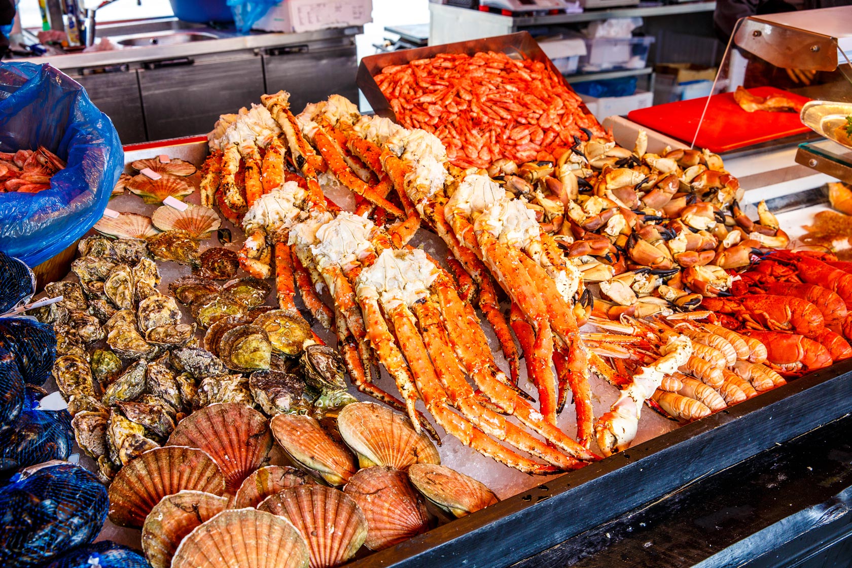 Various seafood on the shelves of the fish market in Norway, Bergen
