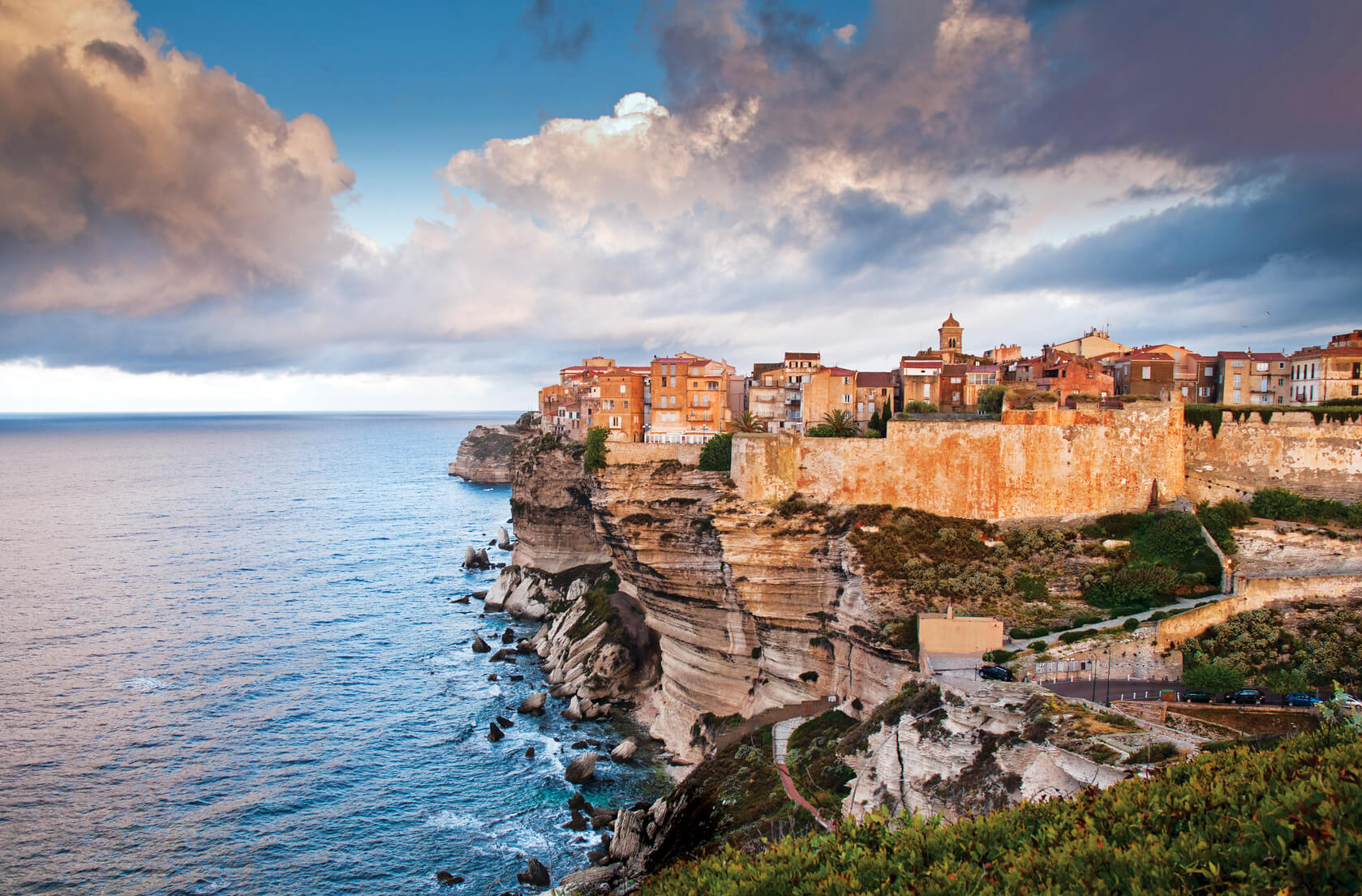 Bonifacio, Corsica, Above, France, City, Beach, Built Structure, Cliff, Coastline, Dramatic Sky, Europe, Famous Place, French Culture, Harbor, History, Horizontal, Island, Majestic, Mediterranean Culture, Sea, Nature, No People, Old, Outdoors, Photography, Rock - Object, Sandstone, Scenics - Nature, Seascape, Sky, Steep, Stone - Object, Town, Travel Destinations, Village, Water's Edge